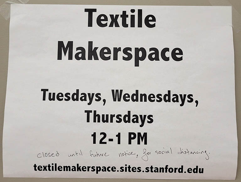 The Textile Makerspace sign, with a handwritten note that it is closed until further notice for social distancing.
