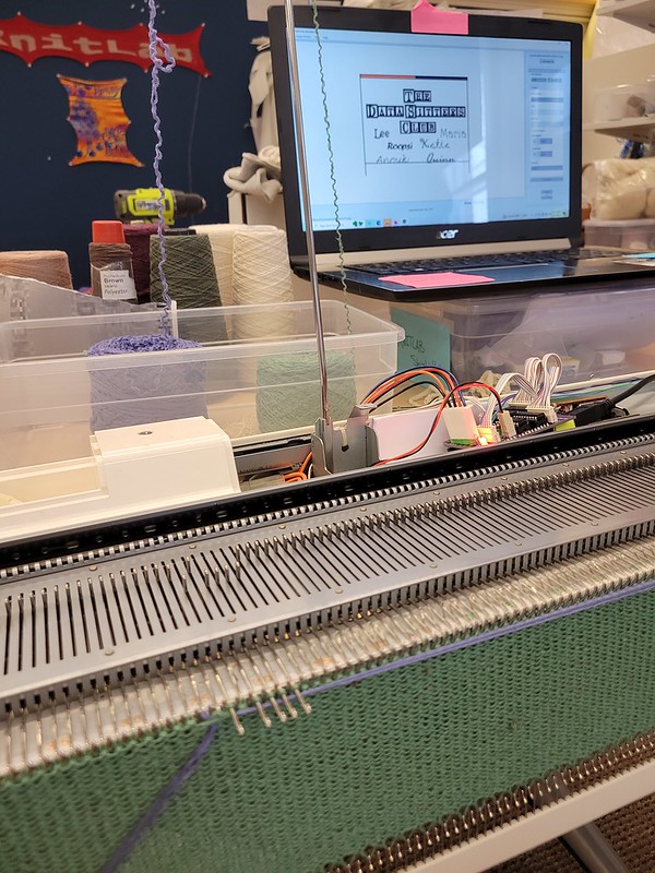 A digital image being knitted on a hacked KH-940 digital knitting machine